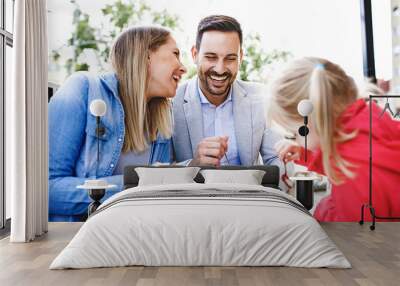 Family enjoying restaurant Wall mural