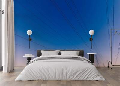 high voltage post.High-voltage tower sky background. Wall mural