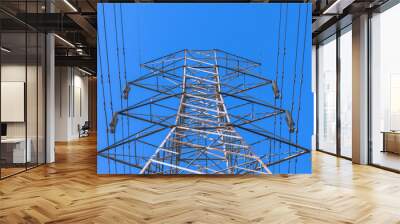 high voltage post.High-voltage tower sky background. Wall mural