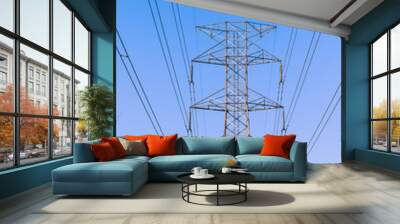 high voltage post.High-voltage tower sky background. Wall mural