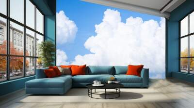 View of beautiful white clouds in a blue sky,blue sea on sunny day with cloudy sky over it. Wall mural