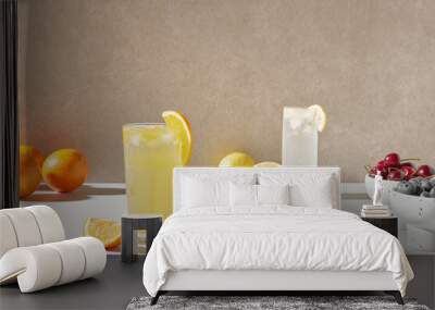 Colorful color background. Refreshing and fresh
oranges, lemons and other fruits full of vitamins. Wall mural