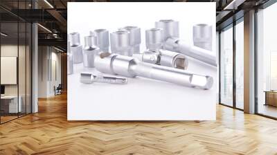 Set of socket head in different sizes with a key on a white background Wall mural