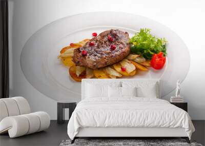 Beef steak with potatoes on a white plate Wall mural