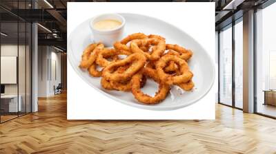 Squid rings, deep fried with sauce on white background Wall mural