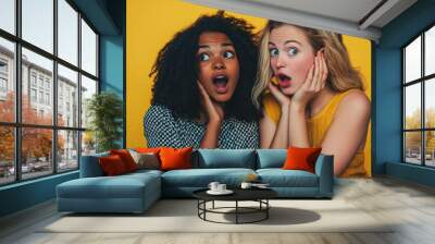  friends sharing a surprised moment with vibrant facial expressions against a bright yellow background, showcasing emotions, interaction, and playful energy Wall mural