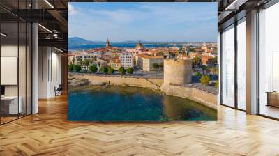 Aerial view of the old town of Alghero in Sardinia. Photo taken with a drone on a sunny day. Panoramic view of the old town and harbor of Alghero, Sardinia, Italy. Wall mural