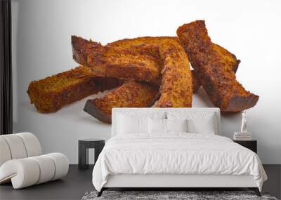 Crispy rye croutons, isolated on white background Wall mural