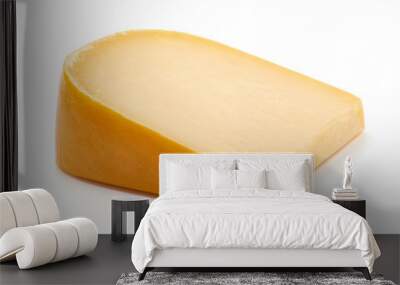 Hard Dutch gouda cheese, close-up, isolated on white background Wall mural