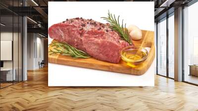 Raw veal meat with spices and oil, prepared for cooking, isolated on white background Wall mural