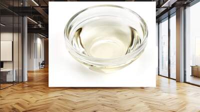 White Vinegar in a glass bowl, isolated on white background. Top view. Wall mural