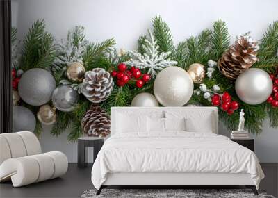 A stunning festive Christmas border featuring pine branches, ornamental balls, and natural elements. Perfect for holiday season decoration ideas and inspiration. Wall mural