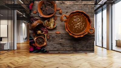 Mexican mole sauce on wooden background Wall mural