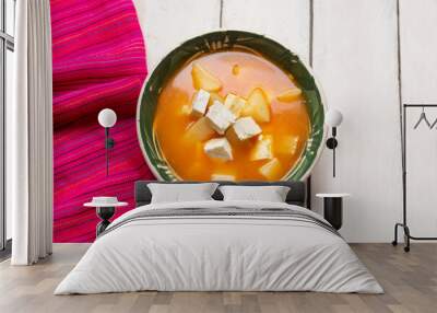 Mexican potato soup with panela cheese on white background Wall mural