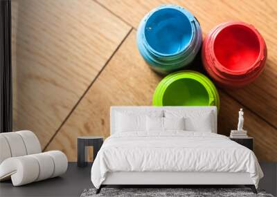 colored ink bottles on a wooden floor  Wall mural