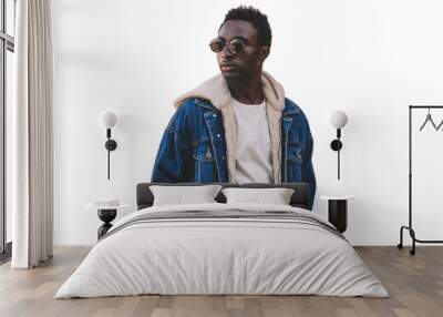 Portrait of stylish young african man model wearing denim jacket isolated on a white background Wall mural