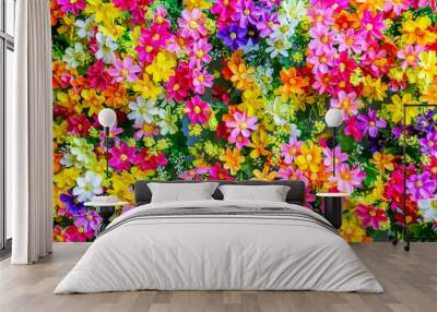 The small colorful fabric flowers backdrop or background for decoratin to make place romantic. Wall mural