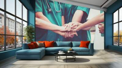 Doctors and nurses coordinate hands. Concept Teamwork Wall mural