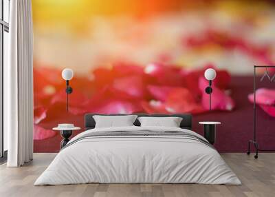 Wedding rings placed on a bed of roses. Wall mural