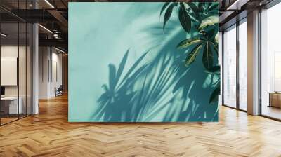 A tropical plant s leaf shadow cast on a light blue background providing copy space View from above Wall mural