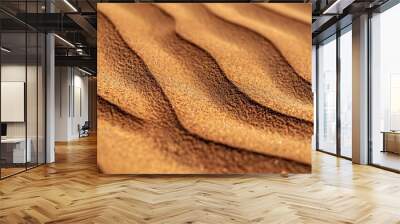 Background with textured brown sand providing copy space image. Wall mural