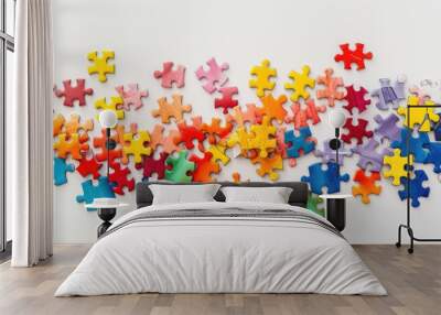 Colorful puzzles on white background for motor skill and cognitive development Copy space image Wall mural