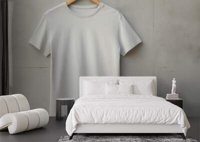 Copy space image of a light textured background with a blank grey t shirt Wall mural