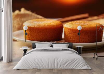 Homemade pumpkin cakes on cotton fabric background with copy space Wall mural