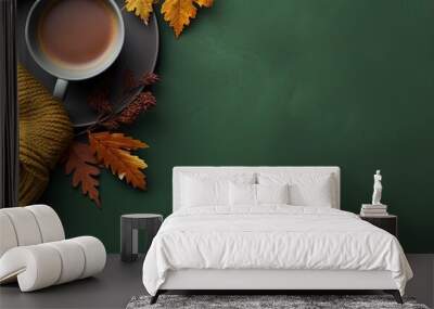 knitted scarf with warm cup of tea on green background autumn fall season still life top view falt l Wall mural