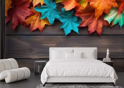 Wooden background with colorful Autumn Leaves. copy space available Wall mural