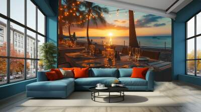 Decorated table at the beach resort in sunset time near the sea and sand for wedding and party events celebrations Wall mural