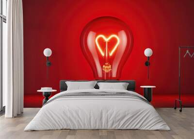 Light bulb with a heart shape glowing filament on a red background, Valentine day concept Wall mural