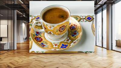 Traditional Turkish Coffee in elegant,gilded coffee cup,above view Wall mural