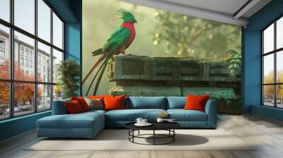 A vibrant Quetzal bird sits atop weathered stone ruins amidst lush greenery in a serene yet mysterious environment Wall mural