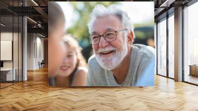 Grandfather's Joy: A heartwarming moment captured as a loving grandfather shares laughter with his grandchildren, radiating joy and family connection.  Wall mural