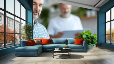 Two individuals are shown reading menus at a fresh salad restaurant, suggesting a focus on health-conscious dining, fresh ingredients, and the social experience of sharing a meal together. Wall mural