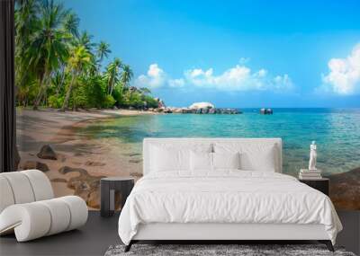 Beautiful tropical beach at exotic island with palm trees Wall mural