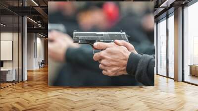 Close-up view of shooter practice handgun shooting in row group Wall mural