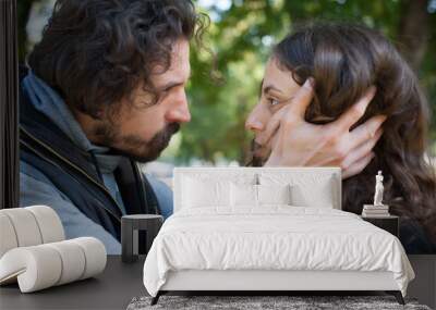 Jealous boyfriend angrily holds his girlfriend head and suspects her Wall mural