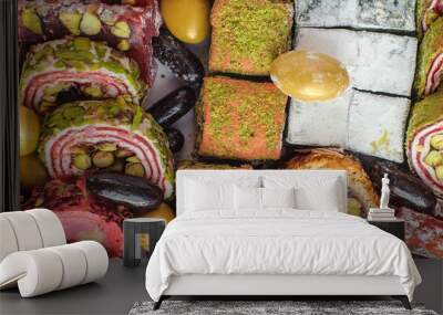 Mix of various pieces of traditional turkish delight. Oriental sweets. Delicious and tasty background. Close-up detail view Wall mural