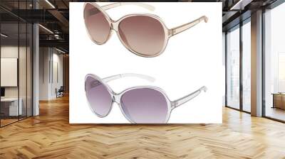 Pair of sunglasses in different colors isolated on white Wall mural