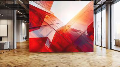 Red glass facade reflecting sunlight in a modern cityscape. A low-angle perspective of a red glass skyscraper facade reflecting sunlight, creating an abstract geometric background pattern Wall mural