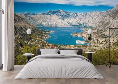 Sea coastline, view to the city surrounded by mountains Wall mural