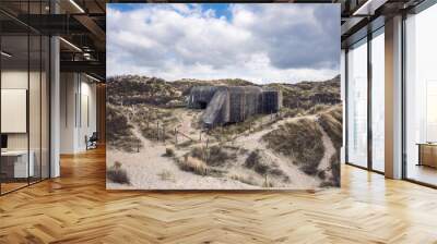 Koksijde, West Flanders, Belgium - 04 06 2021: View of the German WWII Waldersee resistance nest from the Second World War, which was part of the Atlantic Wall, in the sand dunes by the beach Wall mural