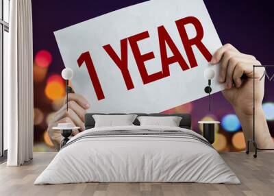 1 Year placard with night lights on background Wall mural