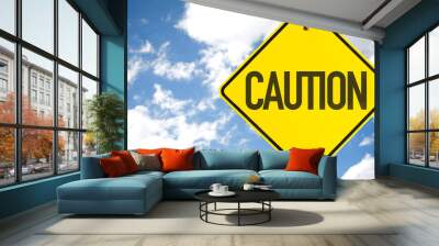 Caution sign with sky background Wall mural