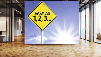 Easy as 1, 2, 3 road sign with sun background Wall mural