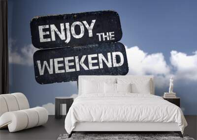 enjoy the weekend sign with clouds and sky background Wall mural