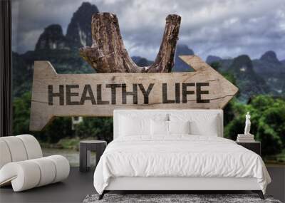 Healthy Life wooden sign with a forest background Wall mural