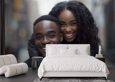 A joyful couple smiling and embracing in an outdoor urban setting, sharing a moment of happiness and togetherness Wall mural